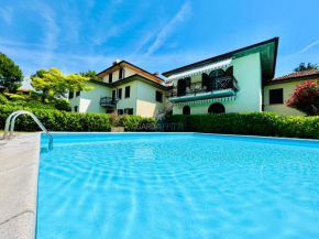 Parigi Apartment - 200m dal Lago con Vista piscina